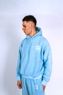 Découvre l’ensemble polaire bleu ciel Syttiz : hoodie et pantalon au confort ultime, coupe oversize et style streetwear unique. Fabriqué pour allier douceur, chaleur et flow urbain. Parfait pour un look mixte tendance et 100% Syttiz.